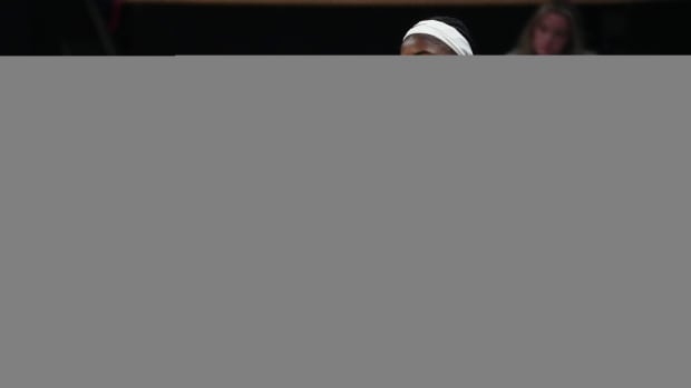 Colorado Buffaloes head coach JR Payne talks to forward Brianna McLeod (25) in the second half against the Oregon Ducks at CU Events Center